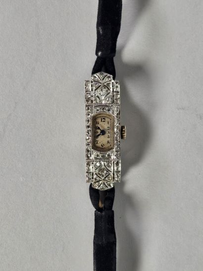 Ladies' wristwatch in openworked 18K (750°/°°)...