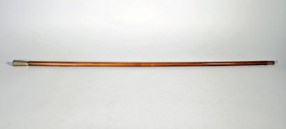 Wooden cane, the pommel in 18K (750°/°°)...