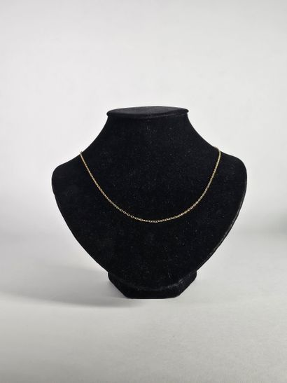 18K (750°/°°) yellow gold forçat chain. 
L...