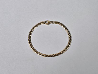 English-link bracelet in 18K (750°/°) yellow...
