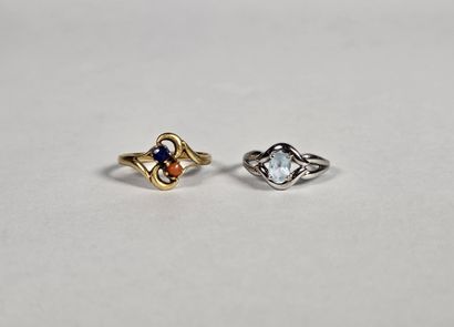 Two rings, one in yellow gold set with colored...