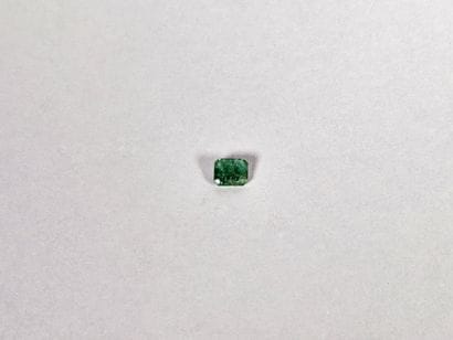 Emerald on paper. Weight: approx. one ca...