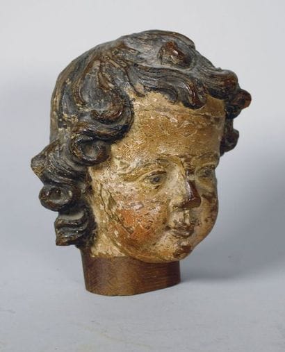 Tête d'ange en bois sculpté et polychromé...