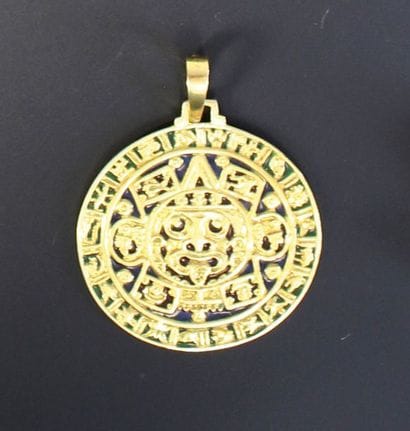 Pendentif circulaire en or jaune 18K (750‰)...