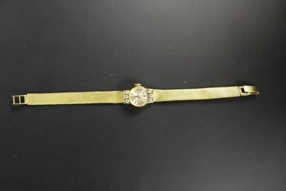 GIRARD PERREGAUX
Montre de dame en or jaune...