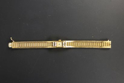 Montre de dame en or jaune 18K (750‰), le...