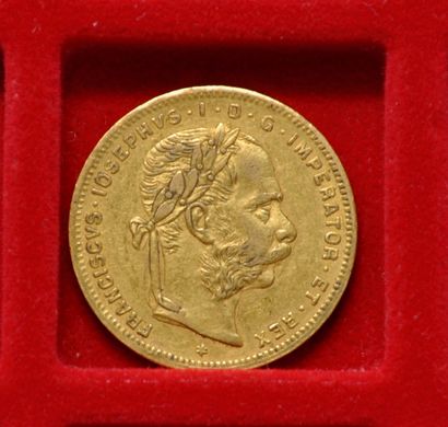Une piece de 20 francs or ou 8 forint Francois...