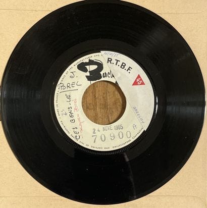 Songs
A 45 rpm test pressing record—Jacques...