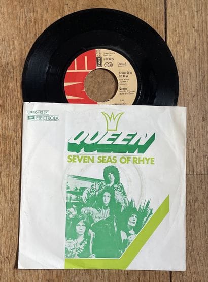 Pop
A 45 rpm record - Queen 