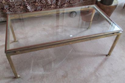 Table basse verre et métal doré 