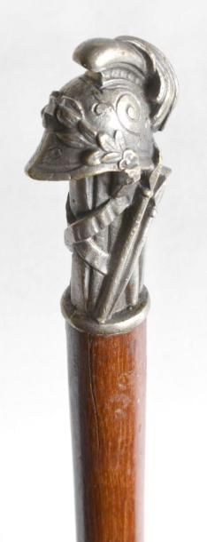 CANNE à pommeau en bronze argenté représentant...