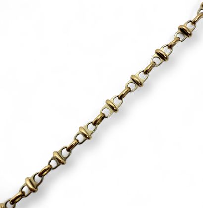BRACELET deux ors 750 mil. maille fantaisie....