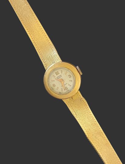 WATCH in 750 mils gold with round dial, flexible...