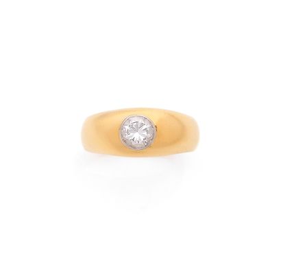 JONC in 750 mils yellow gold, set with a...