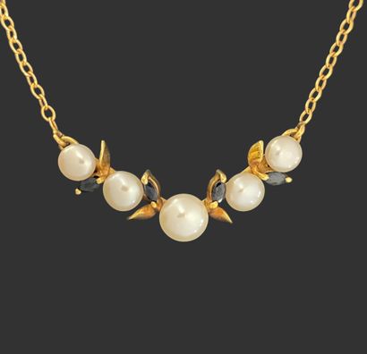 COLLAR in yellow gold 750 mils, holding a...