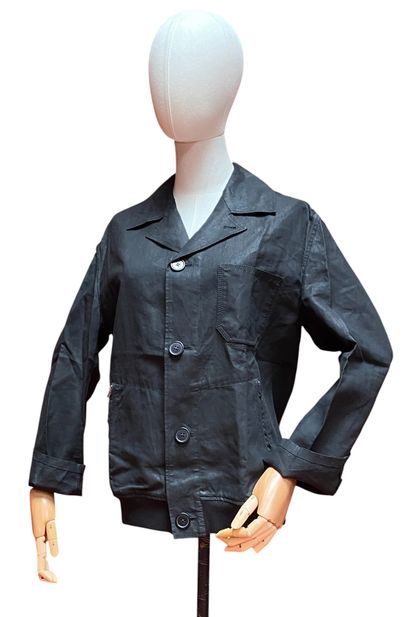 HERMES, Paris. BLOUSON en lin et coton noir....