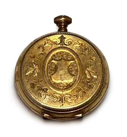 MONTRE de col en or jaune guilloché 750 mil....