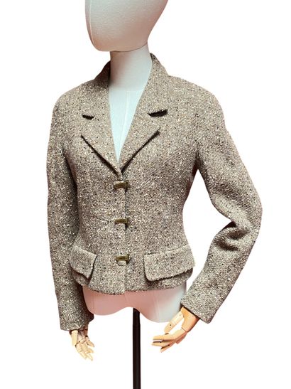 CHANEL. VESTE en laine mélangée, incrustations...