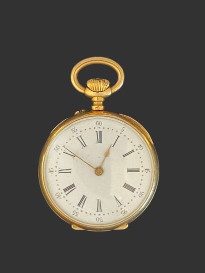 MONTRE DE POCHE en or 750 mil. à décor gravé...