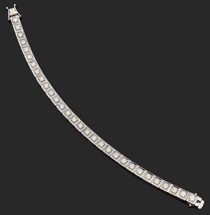 BRACELET rivière en or blanc 750 mil., serti...