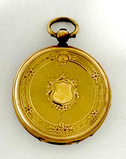 MONTRE de col en or jaune 750 mil., le revers...