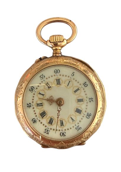 MONTRE de COL en or jaune 750 mil. guilloché...