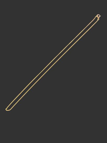 750 mils yellow gold gourmette chain. Weight:...