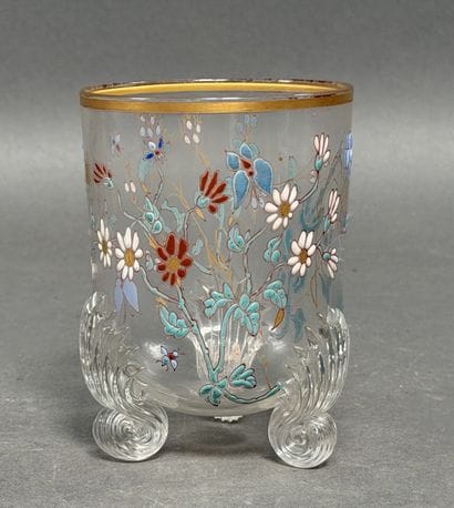 E. GALLE, Nancy. Small clear glass bowl resting...