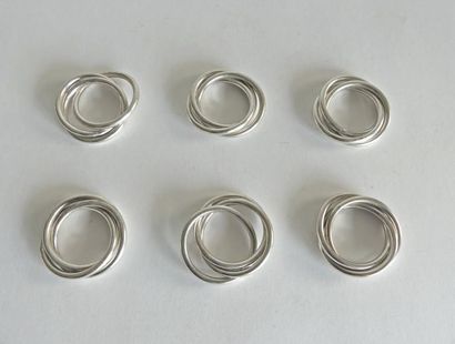 SIX ANNEAUX de SERVIETTES en métal argenté...