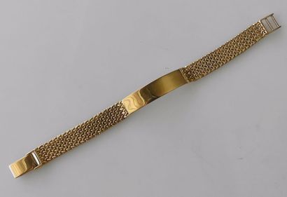 BRACELET ruban en or jaune tissé, la plaque...