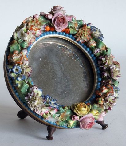 MIROIR à POSER de fomrme circulaire, à décor...