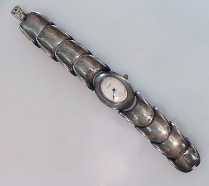 *COSMOS. MONTRE BRACELET en argent, le boitier...