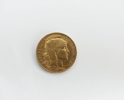 PIECE de 20 francs or. Poids 6,45 g 