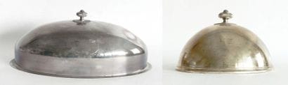 DEUX CLOCHES en métal argenté, l'une ovale,...