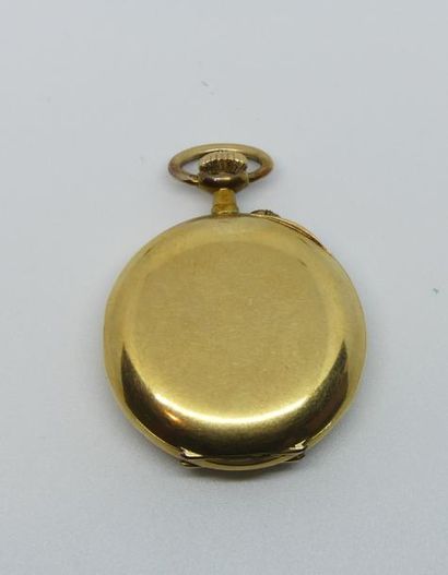 MONTRE de col en or jaune uni, contre cuvette...