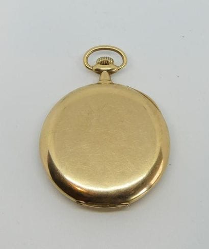 MONTRE de GOUSSET en or jaune 14 k uni, contre...