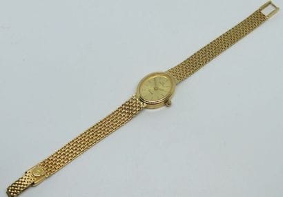 MONTRE BRACELET de dame en or jaune, le boitier...