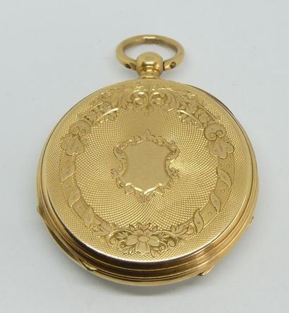 MONTRE GOUSSET en or jaune guilloché d'un...