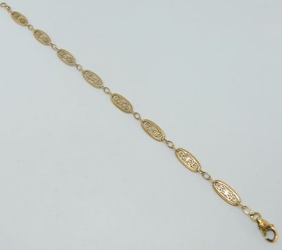 BRACELET en or jaune maille filigranée. Poids...