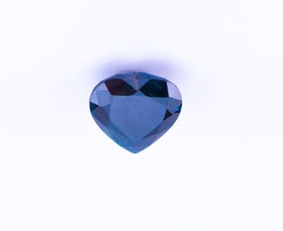 Heart shaped sapphire on paper weighing 28.8...