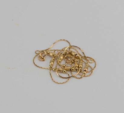 Set of three 18K yellow gold bracelets with...