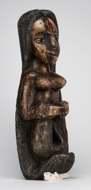 Siren in carved polychrome wood. Togo. H:...