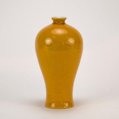 CHINA. Incised porcelain vase with dragon...