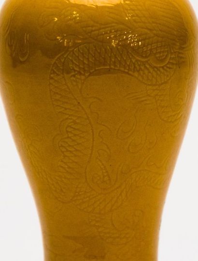 CHINA. Incised porcelain vase with dragon...