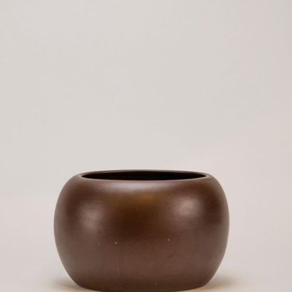 GUCCI. Small brown ceramic vase, stamped...