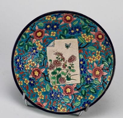 LONGWY. Tripod bowl in woad with central...