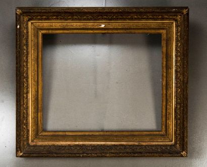 Wooden frame with gilded stucco, decorated...