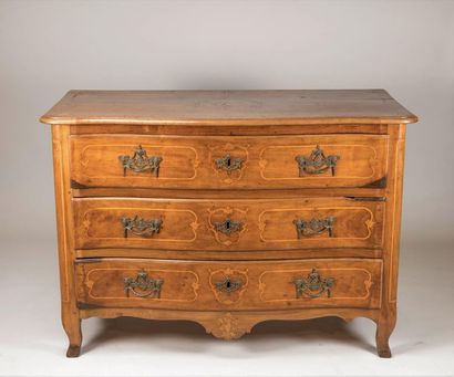 Walnut chest of drawers, slightly curved...