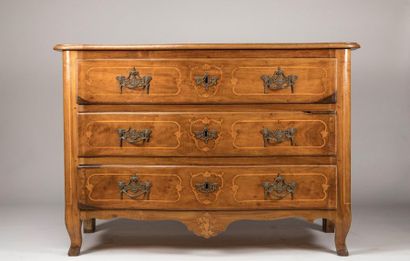 Walnut chest of drawers, slightly curved...