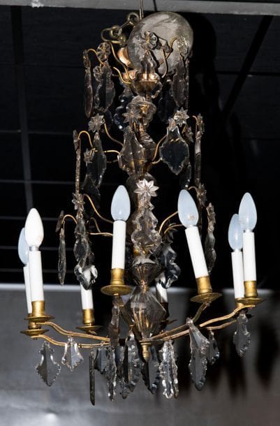 Bronze cage chandelier with eight-light pendants....